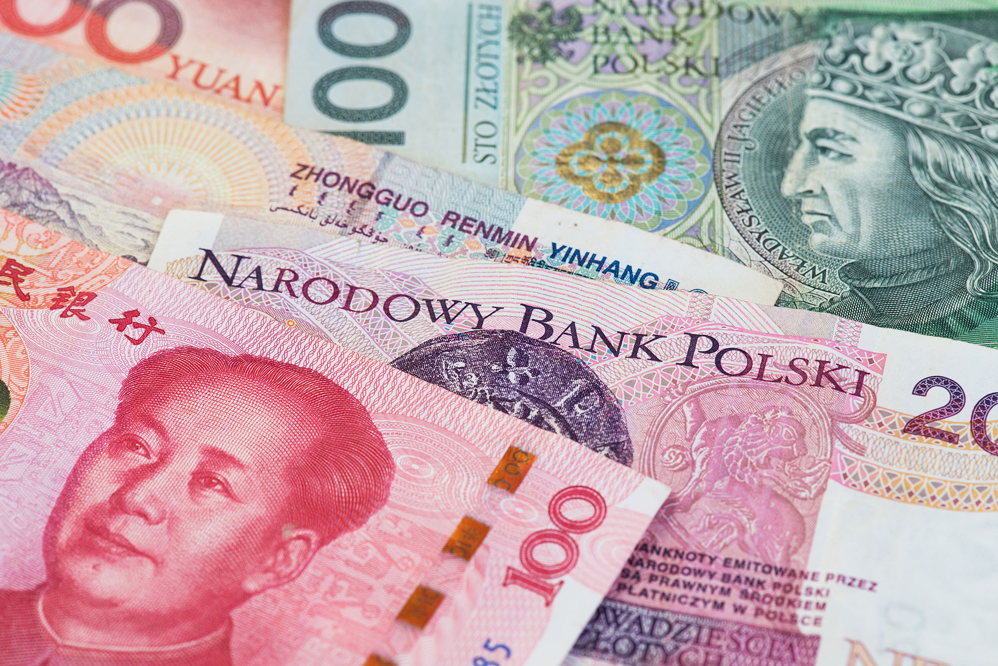 kínai, kötvény, lengyelország, China Yuan Renminbi currency with Poland Zloty banknotes. China Poland Yuan Renminbi Zloty currency