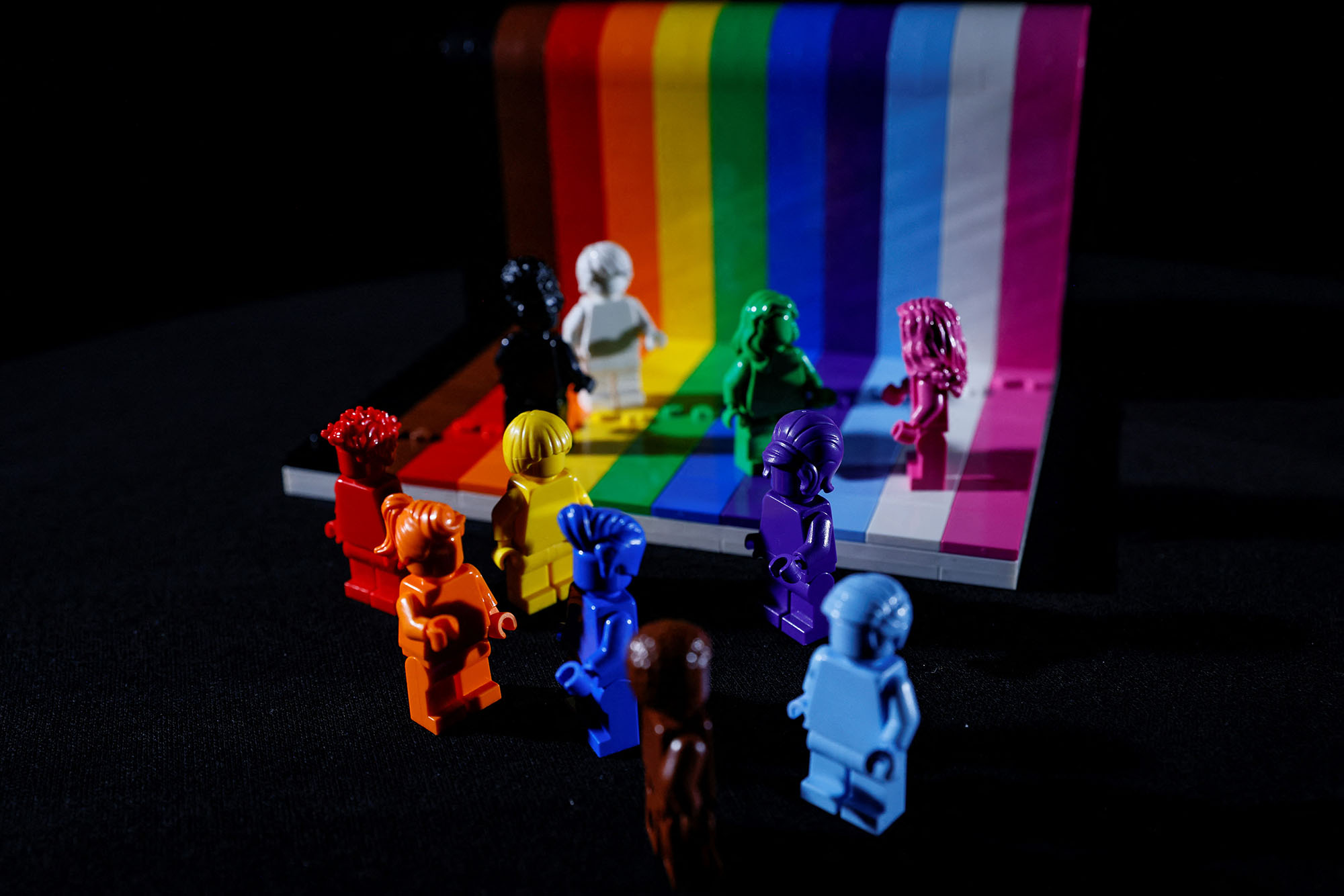 This picture taken on June 3, 2021 shows Danish toy brick maker Lego's "Everyone is Awesome" new set of rainbow-coloured figurines to celebrate the diversity of its fans and the LGBTQI+ community.