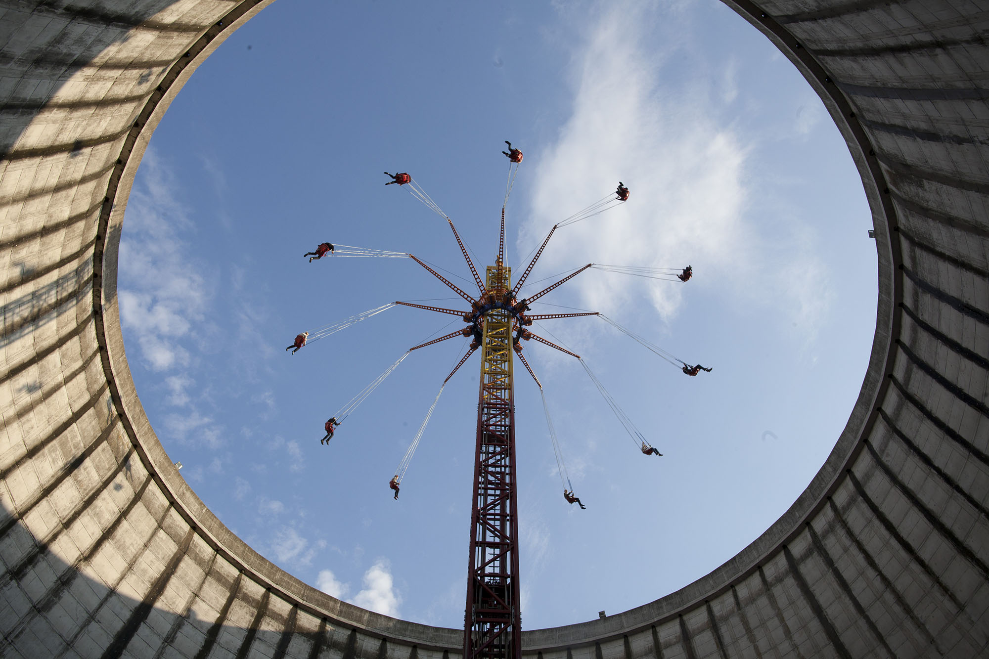 ISSELBURG, GERMANY - AUGUST 20: Children's carousel inside an old cooling tower at Wunderland Kalkar on August 20, 2014, in Isselburg, Germany. Wunderland Kalkar is an amusement park in North Rhine-Westphalia, built on the former site of SNR-300, a nuclear power plant that never went online because of construction problems and protests. Photo by Ute Grabowsky/Photothek via Getty Images)***Local Caption***